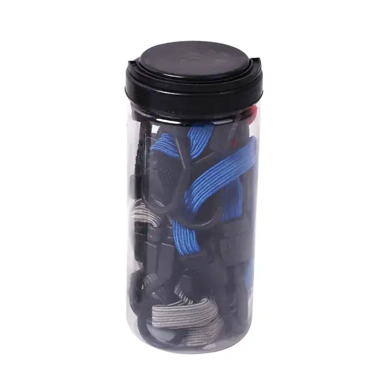 Clear plastic container filled with various climbing slings, carabiners, and quickdraws, ideal for organizing climbing accessories.