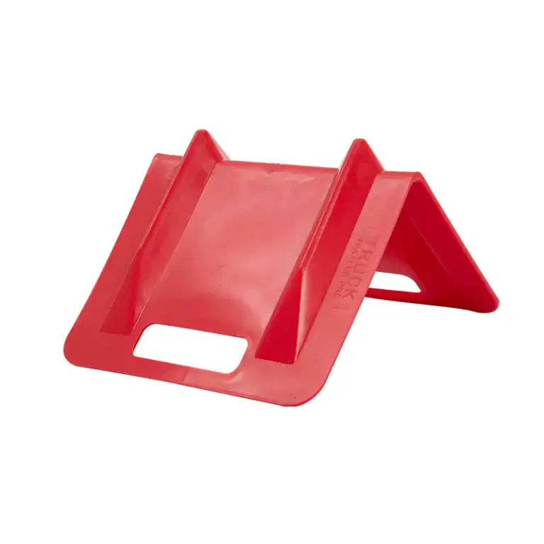 Red traffic cone holder designed for secure placement and easy handling of traffic cones, ideal for construction sites, roadwork, and safety management.