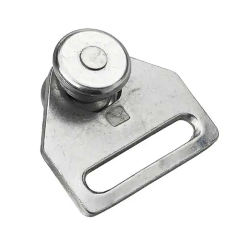 Close-up of a metal barbell collar used to secure weight plates during lifting, ensuring safety and stability in strength training exercises.