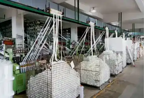 Industrial storage carts with wire mesh sides for efficient warehouse organization and material handling.